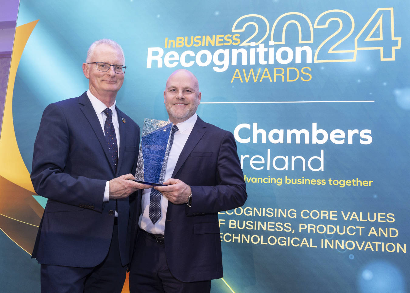 Photo of Peter Hendrick, NBI CEO, receiving the ‘Company of the Year’ award at the Chambers Ireland / InBUSINESS Recognition Awards 2024.